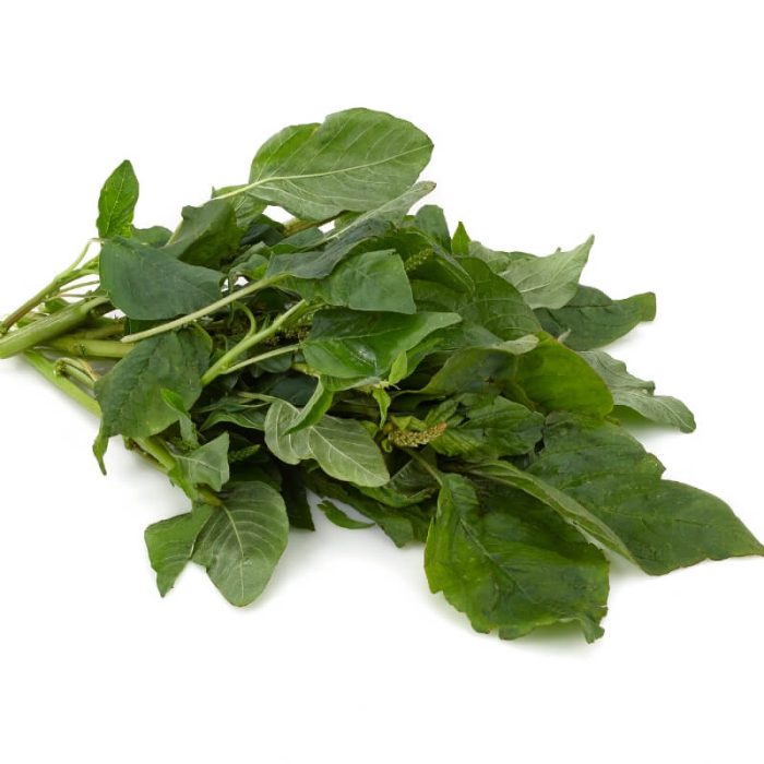 A bunch of fresh Callaloo leaves on a white background.